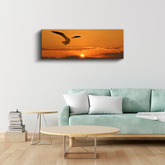 Gün Batımı Martısı - Turuncu Gökyüzünde Süzülen Martı Kanvas Tablo