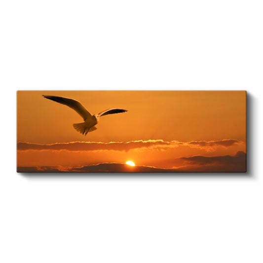 Gün Batımı Martısı - Turuncu Gökyüzünde Süzülen Martı Kanvas Tablo